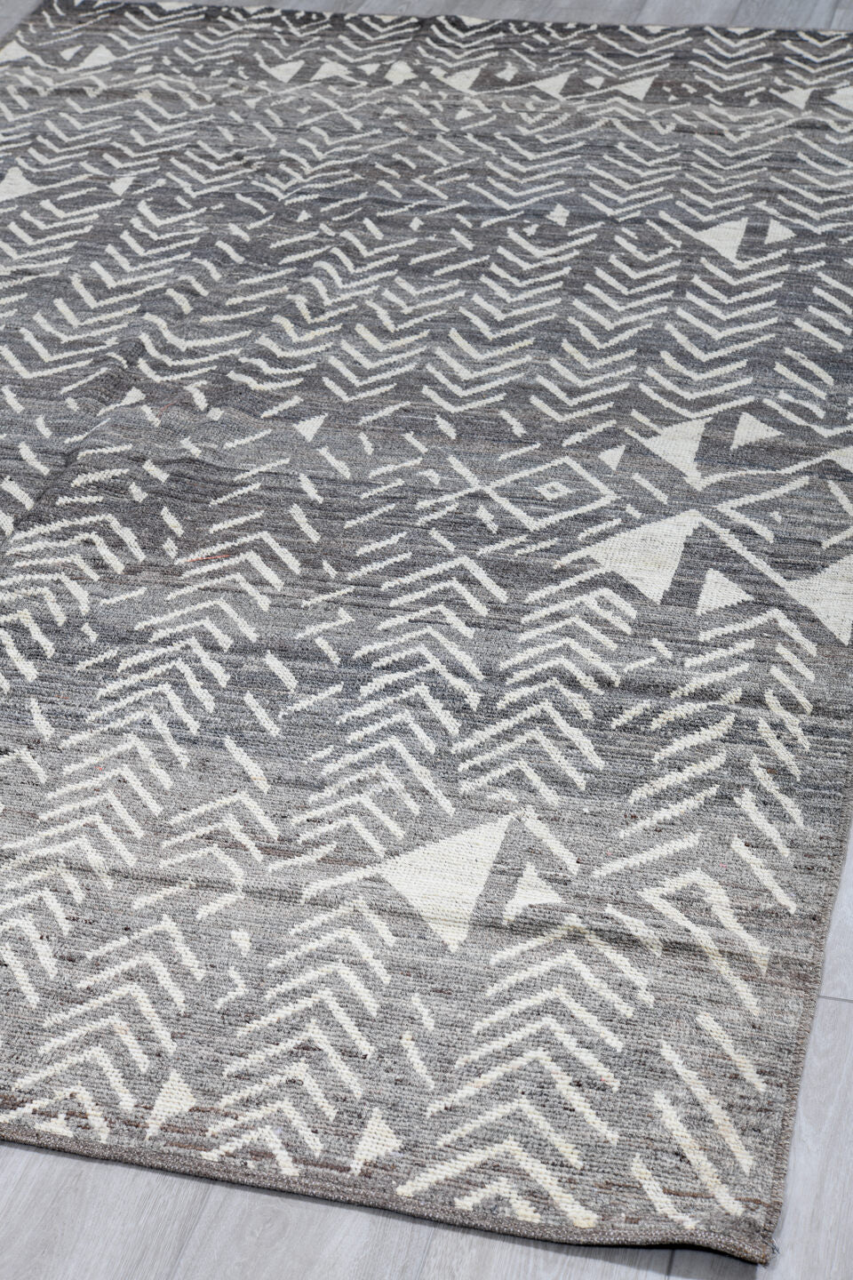 5' x 9' one-of-a-kind handmade vintage Tulu medium size rug. Color palette: gray, ivory, charcoal, taupe, black, beige