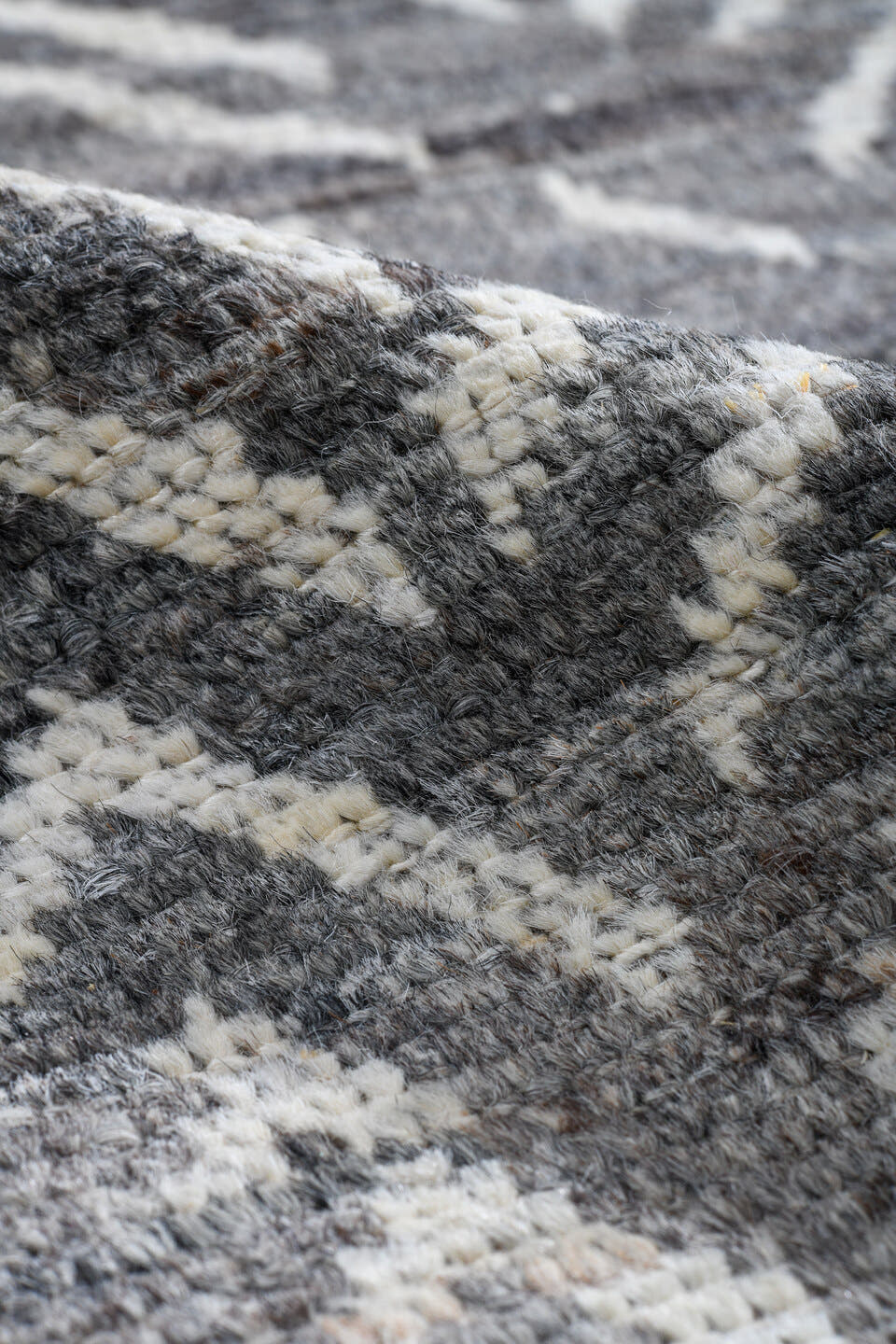 5' x 9' one-of-a-kind handmade vintage Tulu medium size rug. Color palette: gray, ivory, charcoal, taupe, black, beige