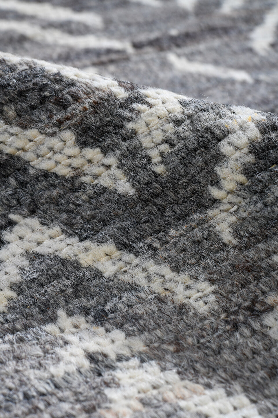 5' x 9' one-of-a-kind handmade vintage Tulu medium size rug. Color palette: gray, ivory, charcoal, taupe, black, beige