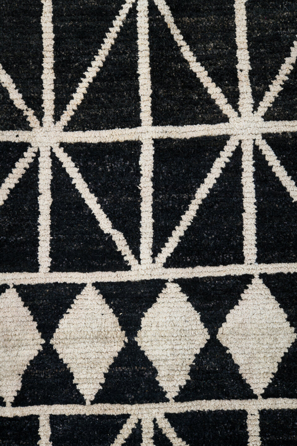 7' x 10' one-of-a-kind handmade vintage Tulu large size rug. Color palette: black, ivory