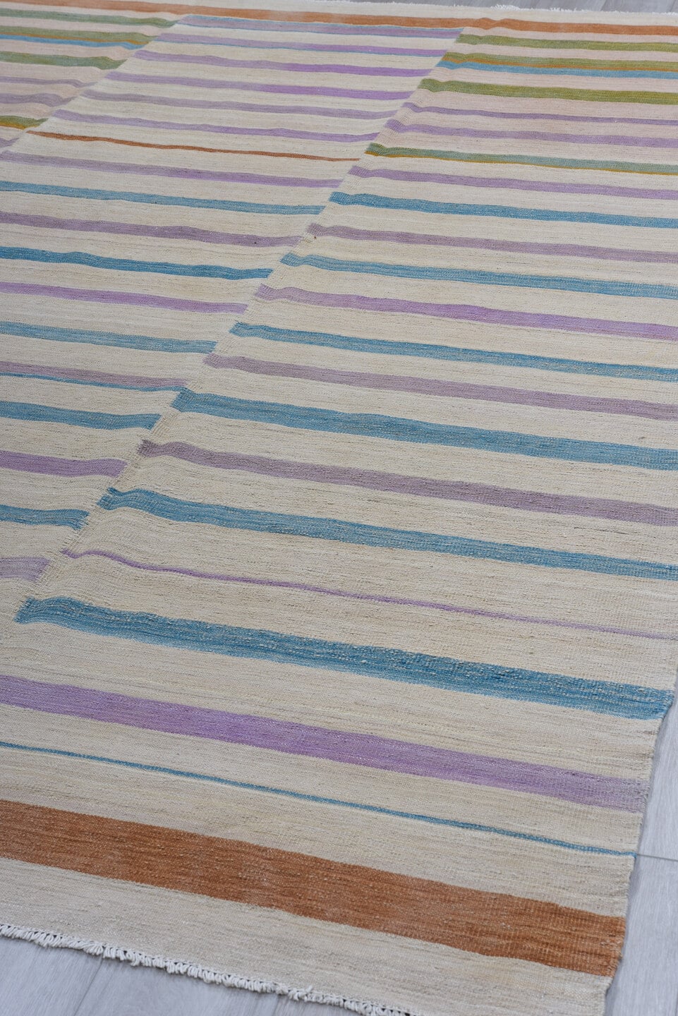 8' x 11' one-of-a-kind handmade vintage Kilim large size rug. Color palette: ivory, lavender, sky_blue, olive, blush, rust