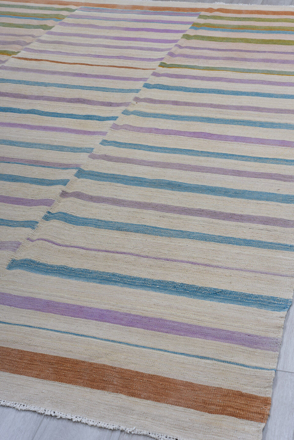 8' x 11' one-of-a-kind handmade vintage Kilim large size rug. Color palette: ivory, lavender, sky_blue, olive, blush, rust