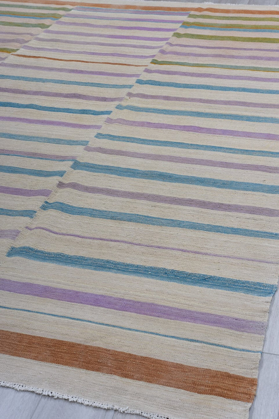 8' x 11' one-of-a-kind handmade vintage Kilim large size rug. Color palette: ivory, lavender, sky blue, olive, blush, rust