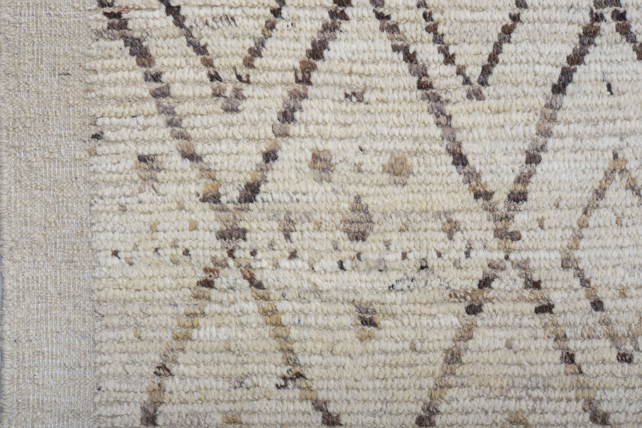 12' x 17' one-of-a-kind handmade vintage Tulu oversize rug. Color palette: ivory, taupe, brown, beige, camel, gray