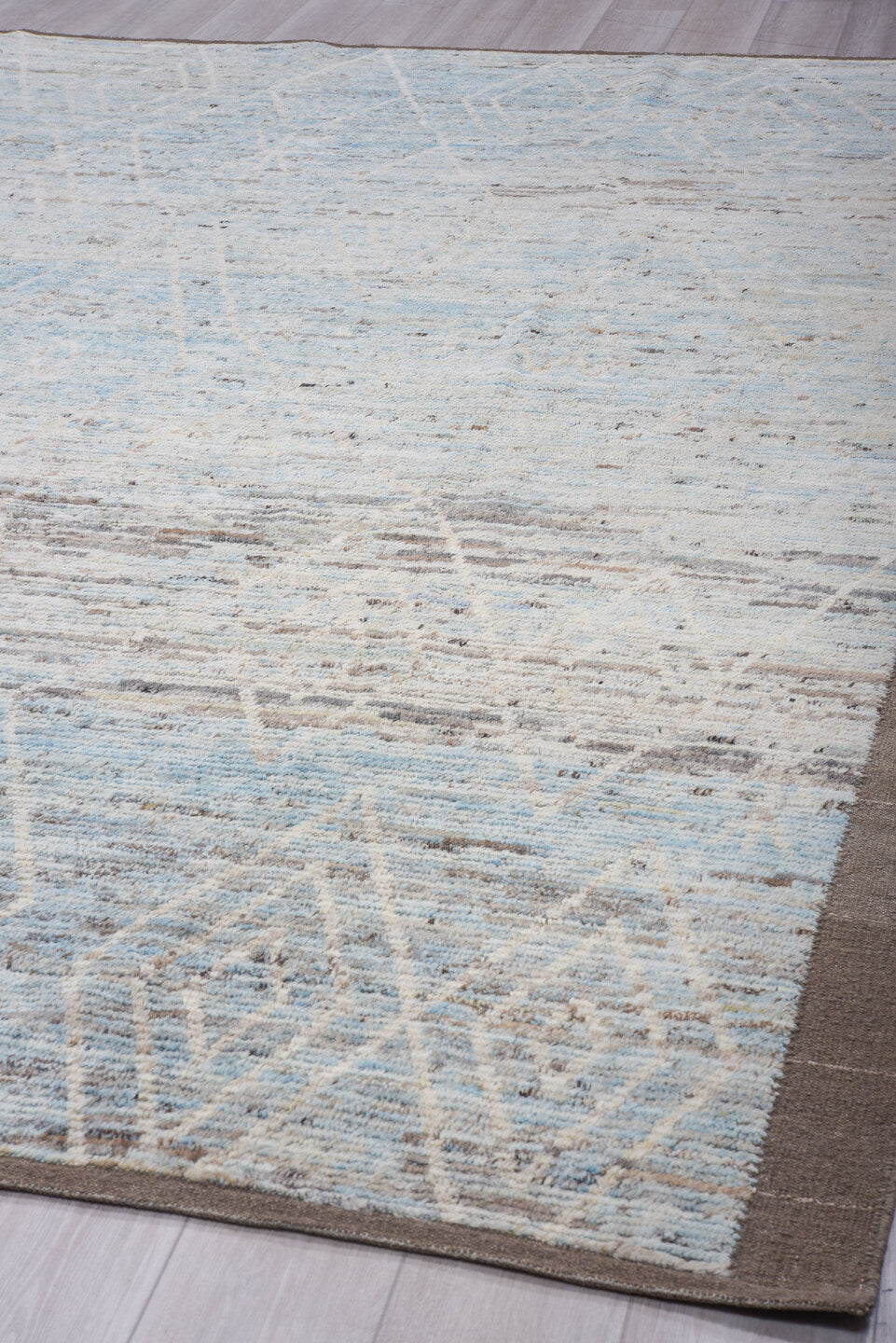 9' x 11' one-of-a-kind handmade vintage Tulu large size rug. Color palette: pale blue, ivory, taupe, gray, light blue, beige