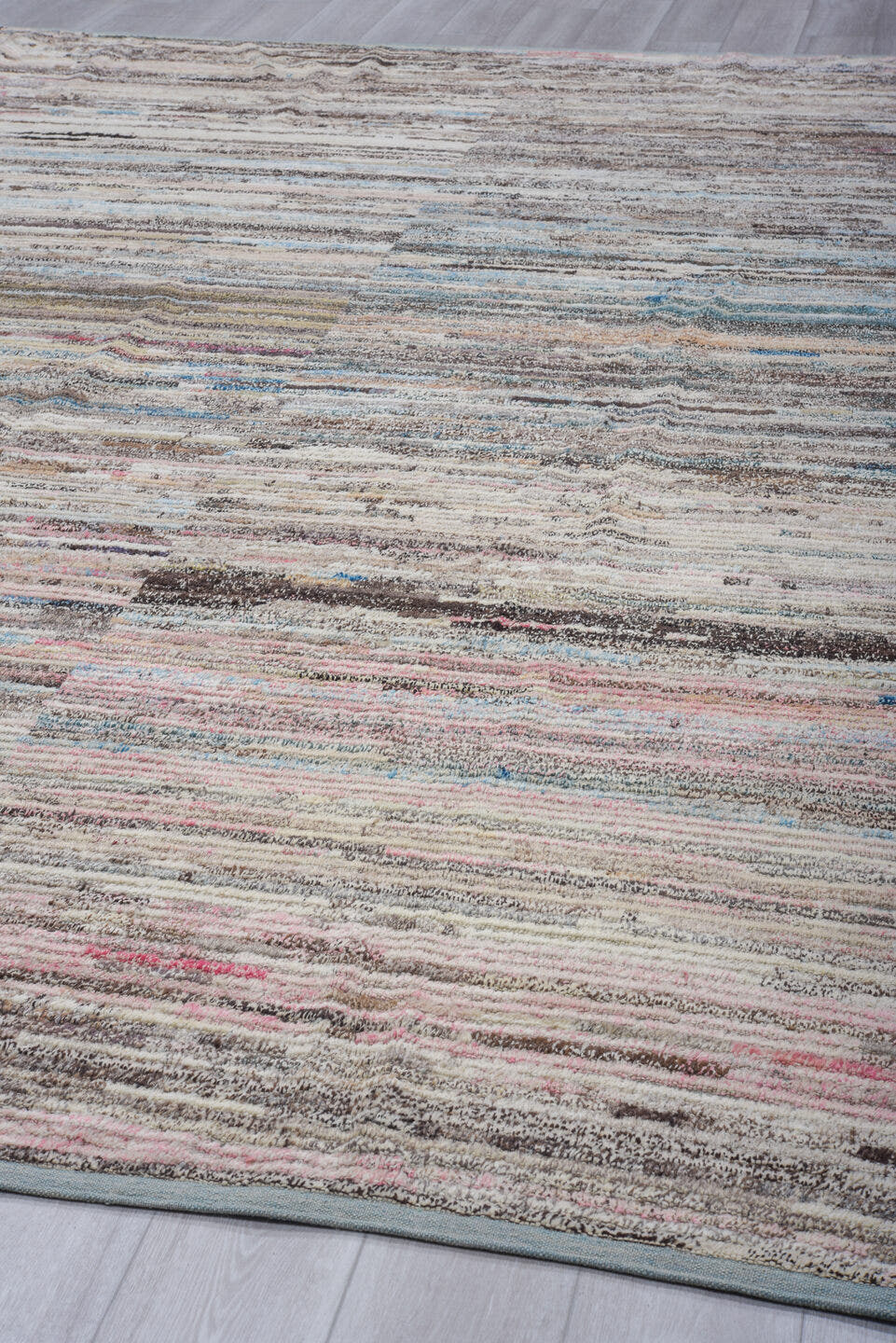 11' x 13' one-of-a-kind handmade vintage Tulu oversize rug. Color palette: ivory, taupe, charcoal, pale blue, blush, brown
