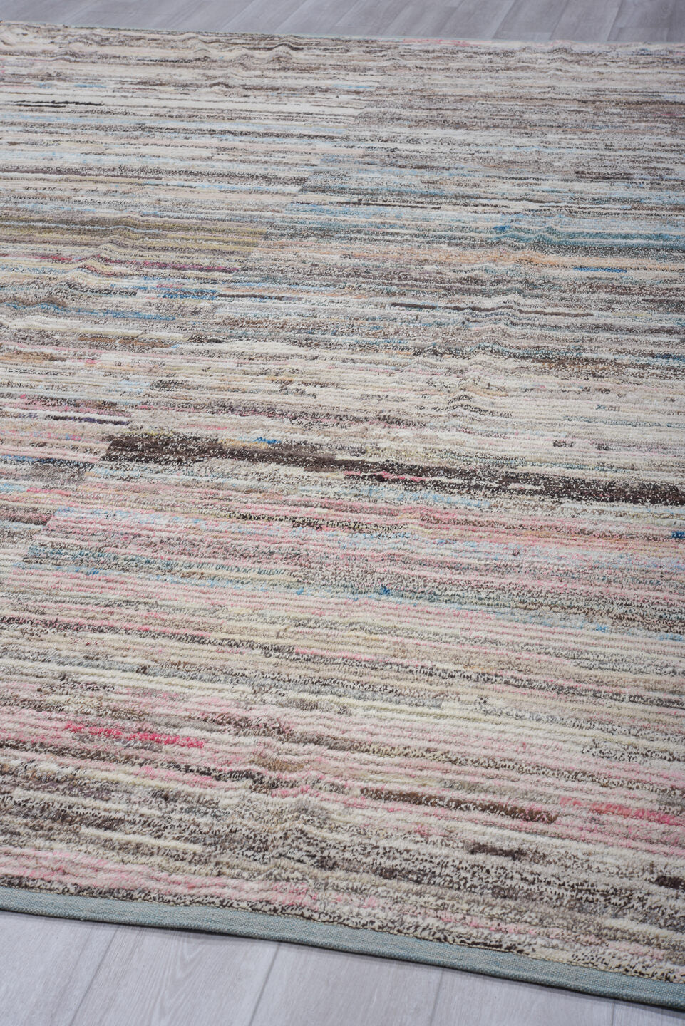 11' x 13' one-of-a-kind handmade vintage Tulu oversize rug. Color palette: ivory, taupe, charcoal, pale blue, blush, brown