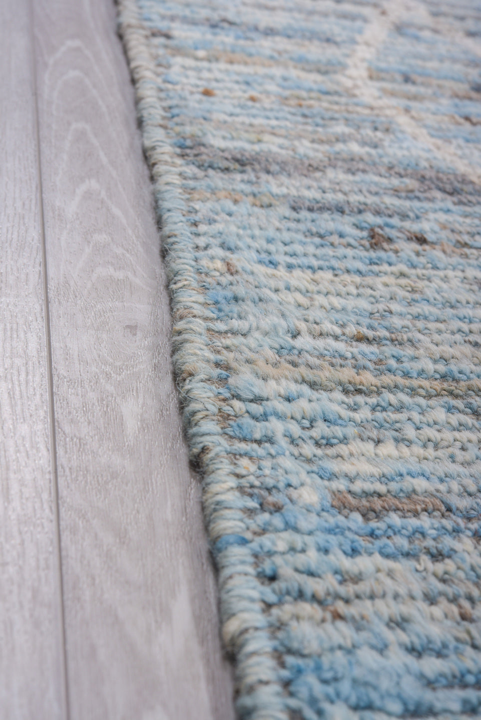 9' x 12' one-of-a-kind handmade vintage Tulu large size rug. Color palette: sky blue, ivory, silver, pale gray, light blue