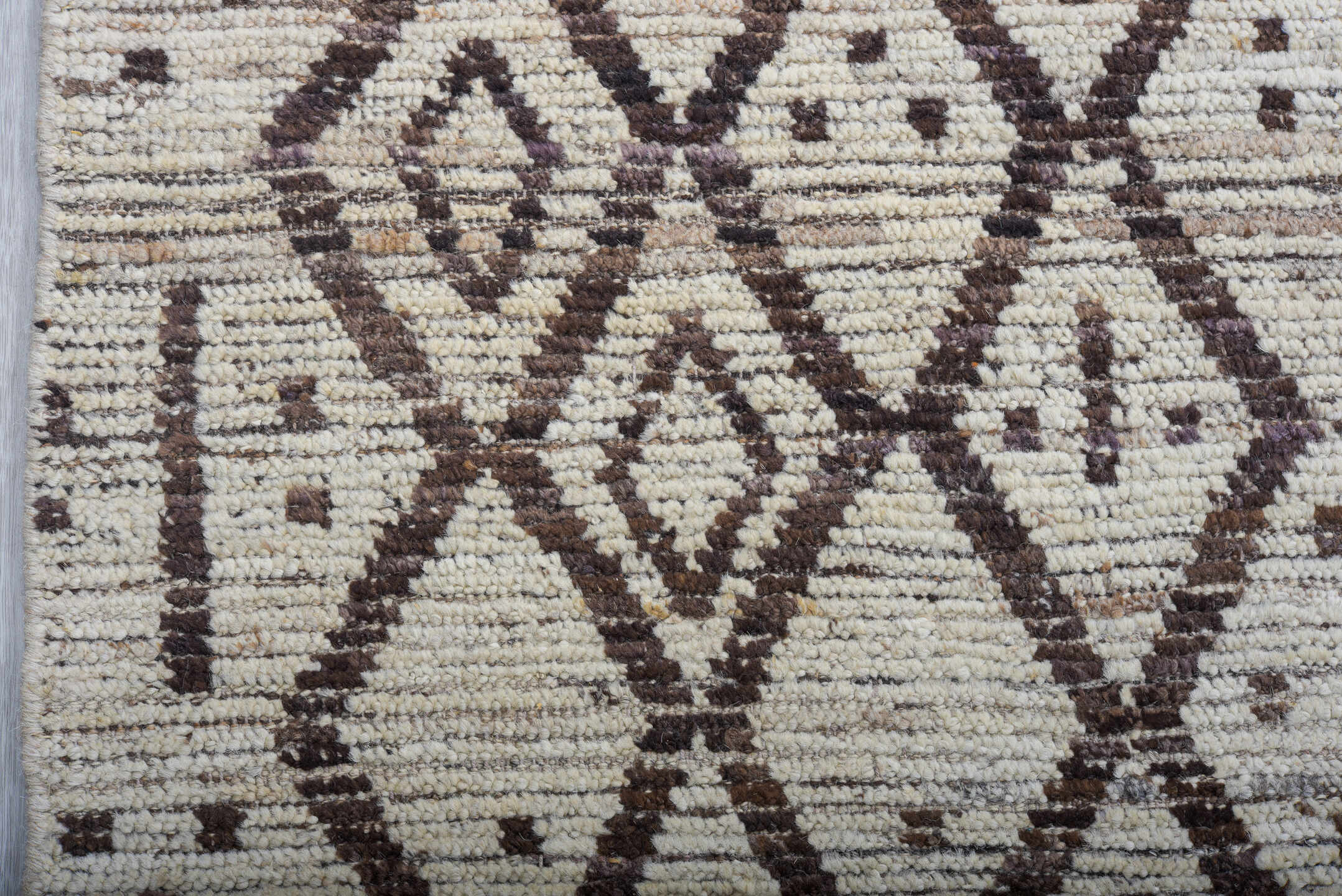 9' x 12' one-of-a-kind handmade vintage Tulu large size rug. Color palette: ivory, charcoal, taupe, brown, gray, black