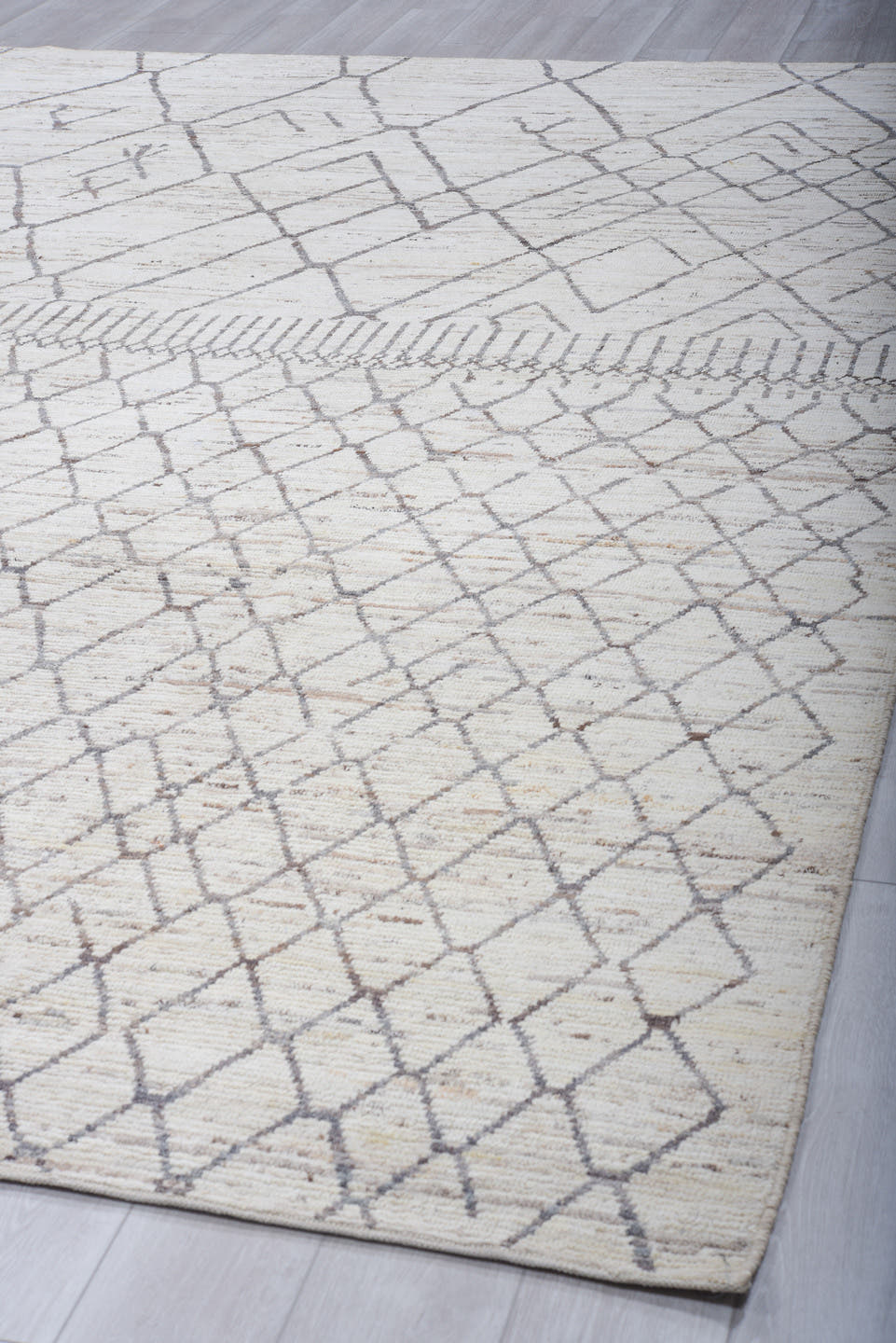 6' x 9' one-of-a-kind handmade vintage Tulu medium size rug. Color palette: ivory, charcoal, taupe, camel, gray, black