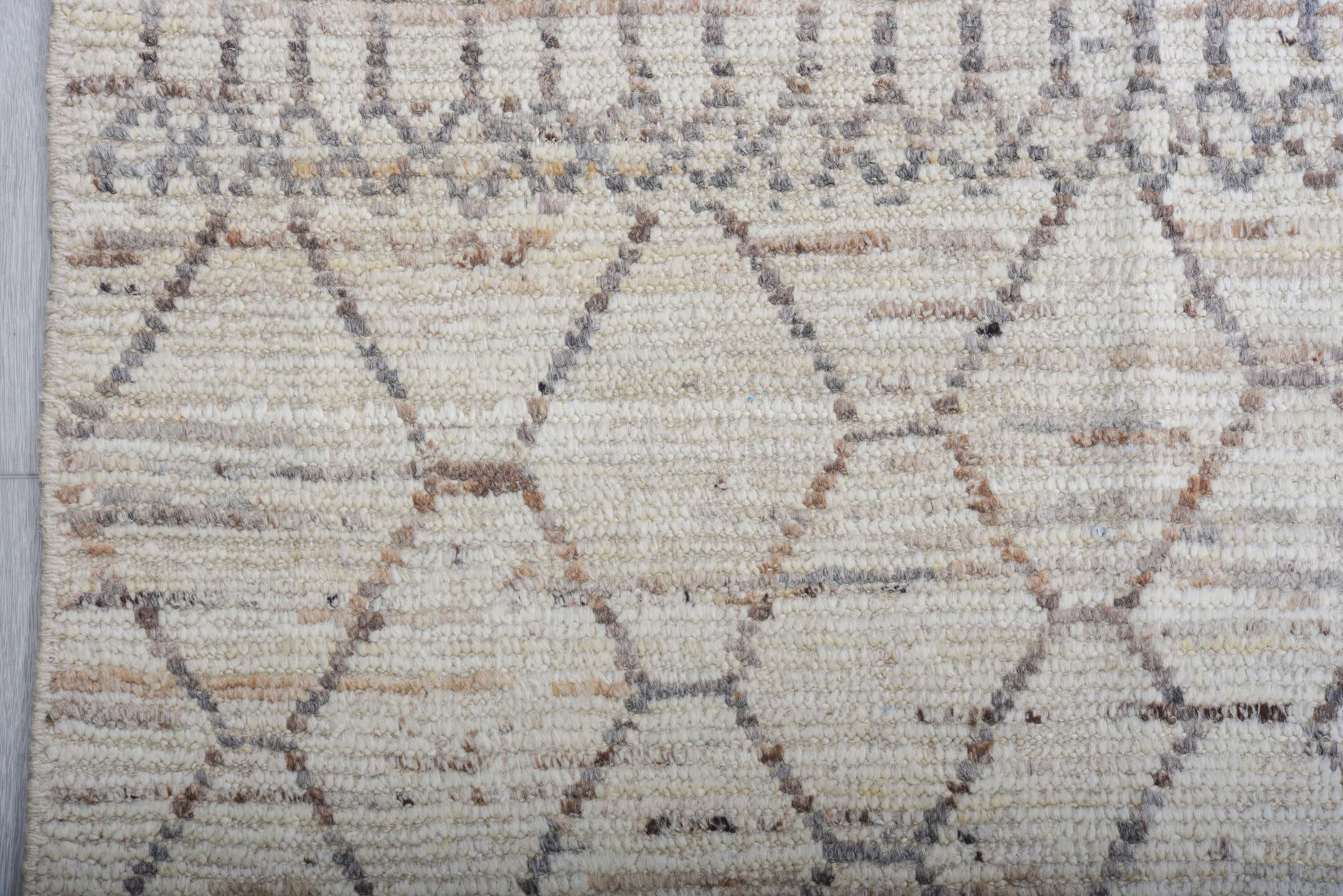 6' x 9' one-of-a-kind handmade vintage Tulu medium size rug. Color palette: ivory, charcoal, taupe, camel, gray, black