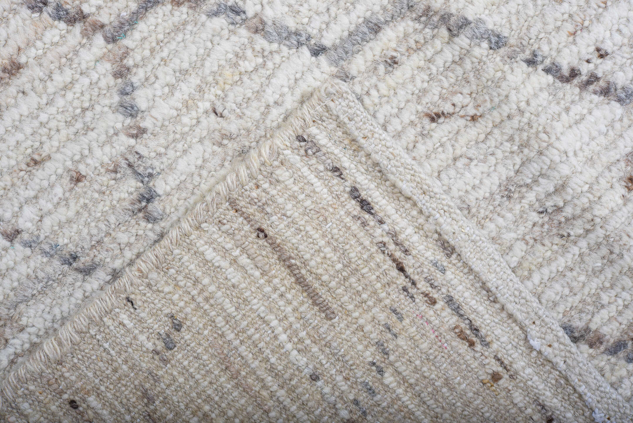 6' x 9' one-of-a-kind handmade vintage Tulu medium size rug. Color palette: ivory, charcoal, taupe, camel, gray, black