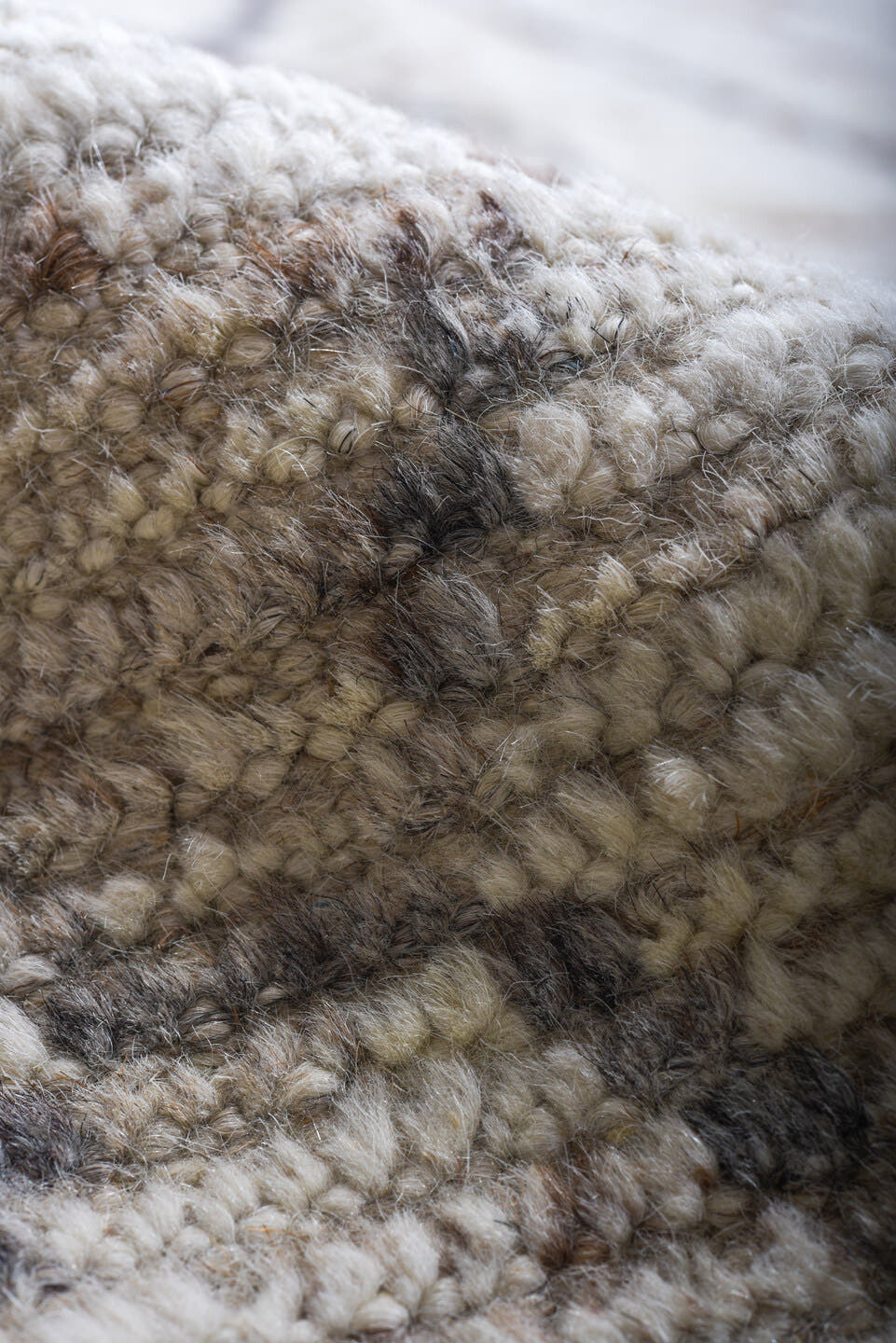 6' x 9' one-of-a-kind handmade vintage Tulu medium size rug. Color palette: ivory, charcoal, taupe, camel, gray, black