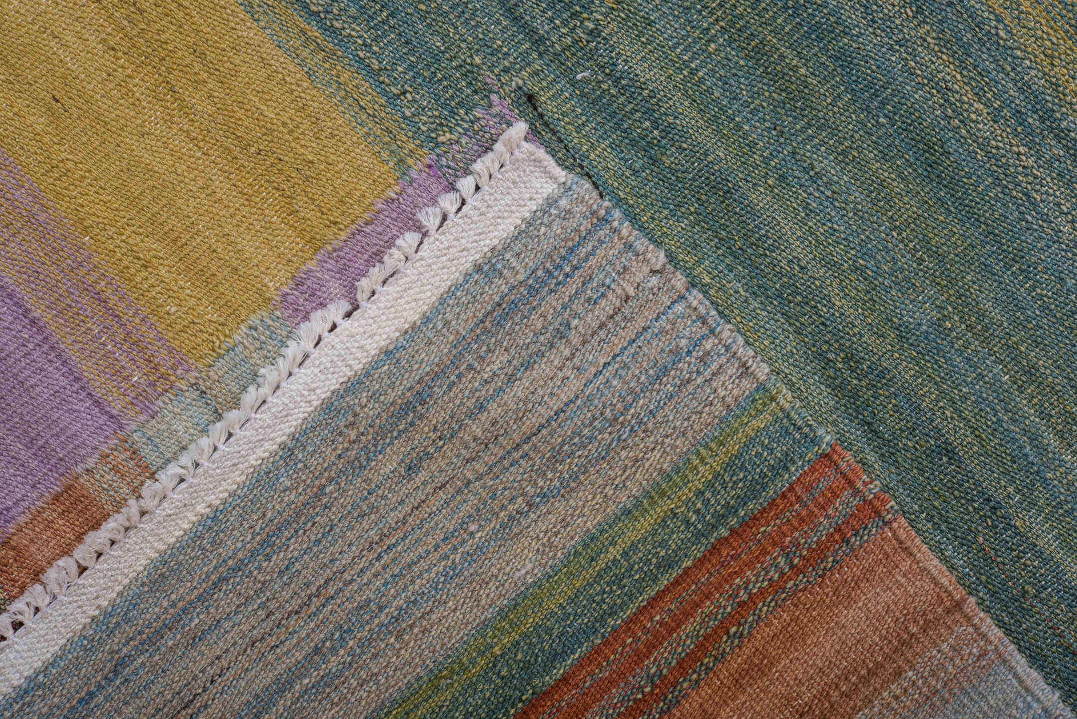 8' x 12' one-of-a-kind handmade vintage Kilim large size rug. Color palette: terra cotta, sage, sky blue, lavender, camel