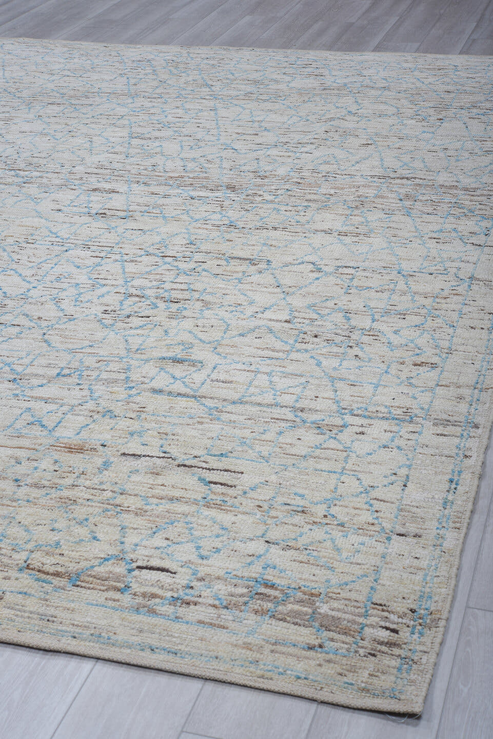 9' x 12' one-of-a-kind handmade vintage Tulu large size rug. Color palette: ivory, pale blue, taupe, gray, light blue, beige