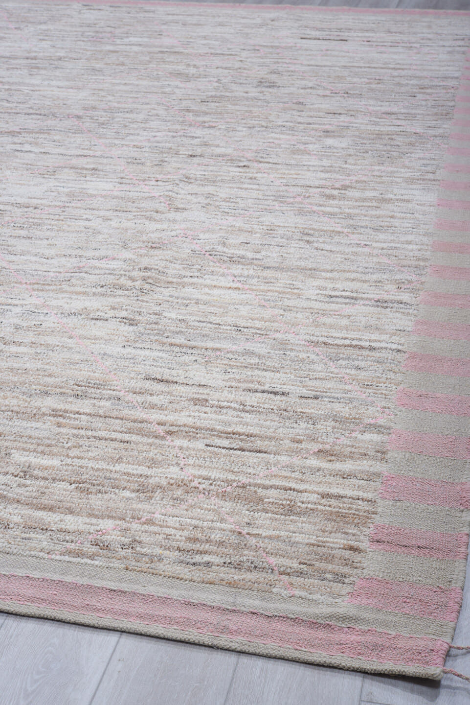 9' x 11' one-of-a-kind handmade vintage Tulu large size rug. Color palette: ivory, taupe, blush, gray, beige, pink