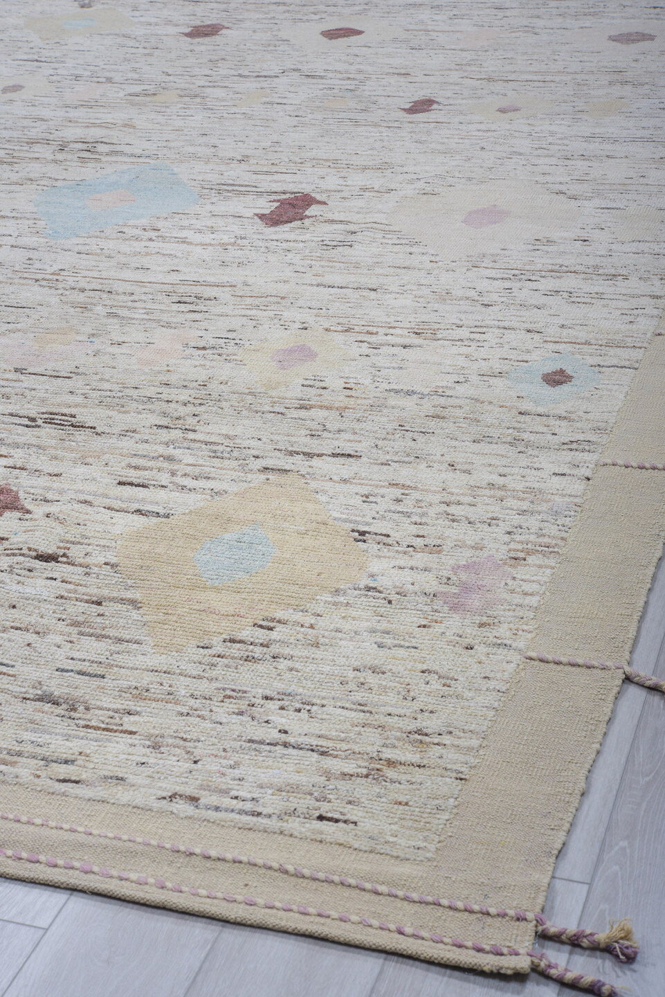 9' x 10' one-of-a-kind handmade vintage Tulu large size rug. Color palette: ivory, taupe, brown, sky_blue, lavender, beige