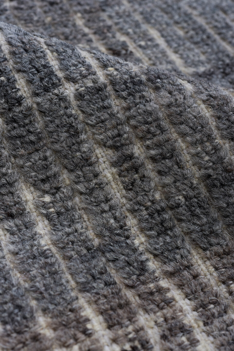 5' x 9' one-of-a-kind handmade vintage Tulu medium size rug. Color palette: gray, charcoal, taupe, ivory, greige, brown