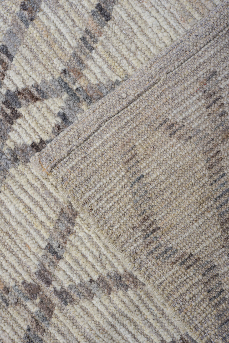 5' x 9' one-of-a-kind handmade vintage Tulu medium size rug. Color palette: ivory, gray, taupe, beige