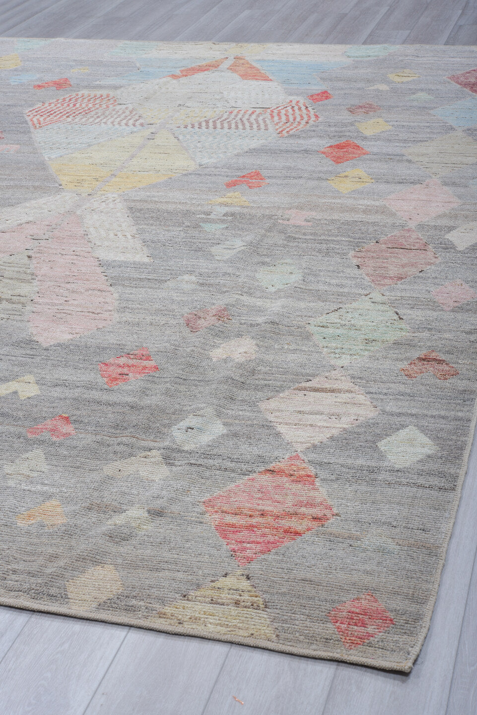 10' x 13' one-of-a-kind handmade vintage Tulu large size rug. Color palette: gray, ivory, blush, faded coral, pale blue