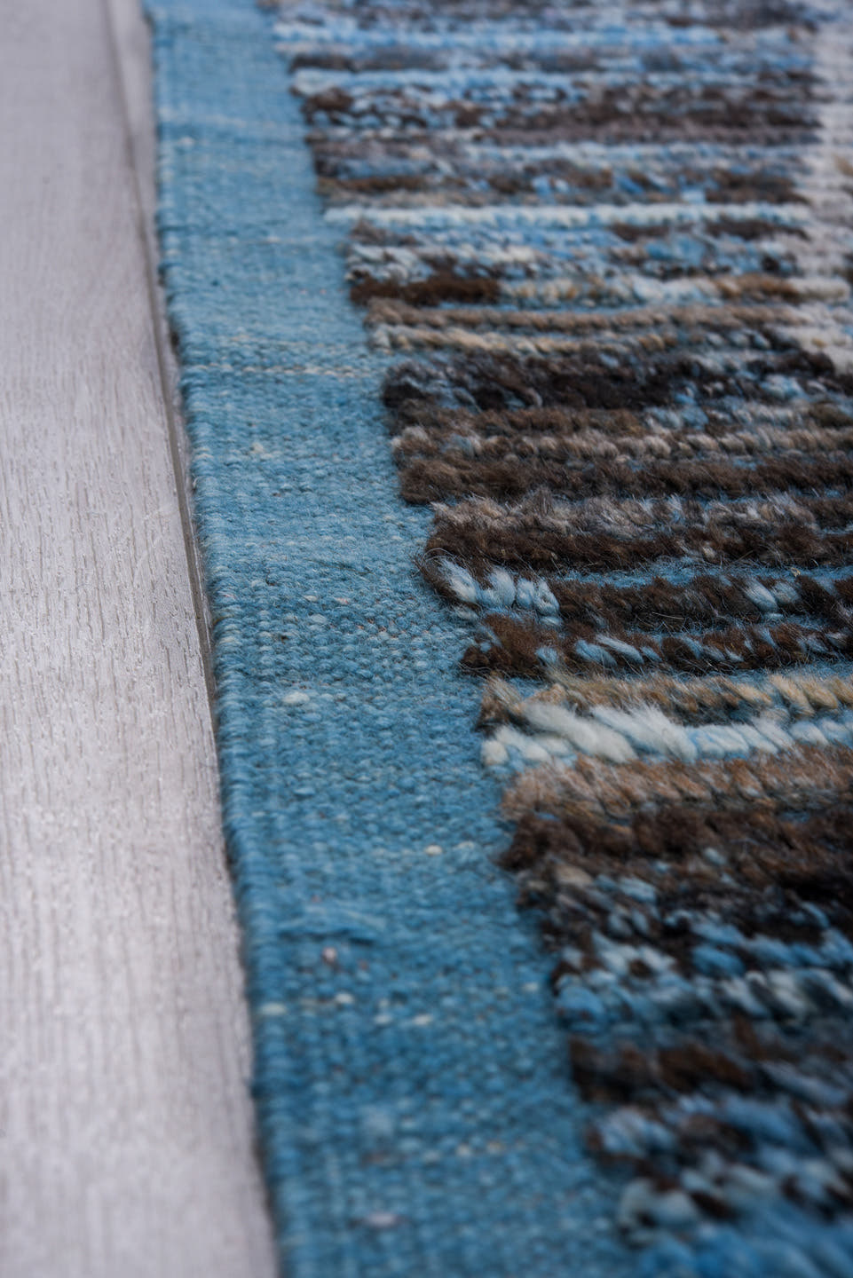 13' x 19' one-of-a-kind handmade vintage Tulu oversize rug. Color palette: blue, charcoal, ivory, slate, gray, black