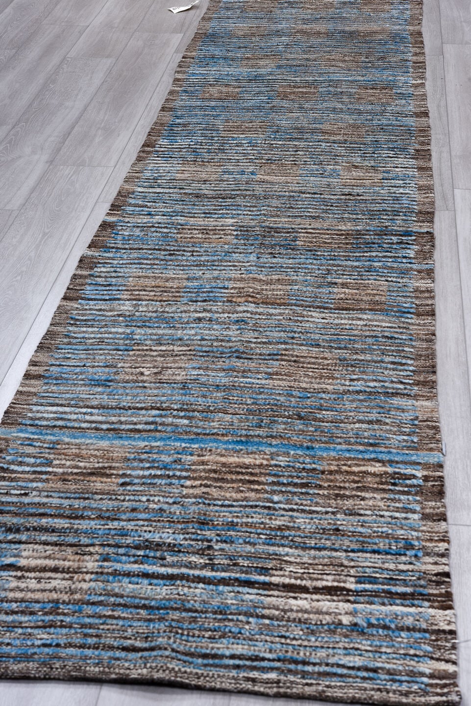 2' x 11' one-of-a-kind handmade vintage Tulu runner rug. Color palette: taupe, sky blue, brown, camel, beige, gray