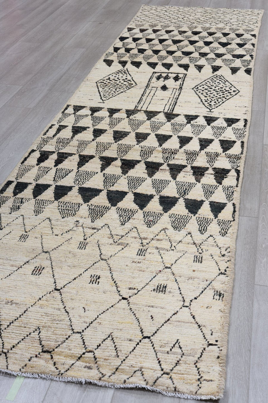 2' x 11' one-of-a-kind handmade vintage Tulu runner rug. Color palette: ivory, charcoal, black, cream, taupe, gray, beige