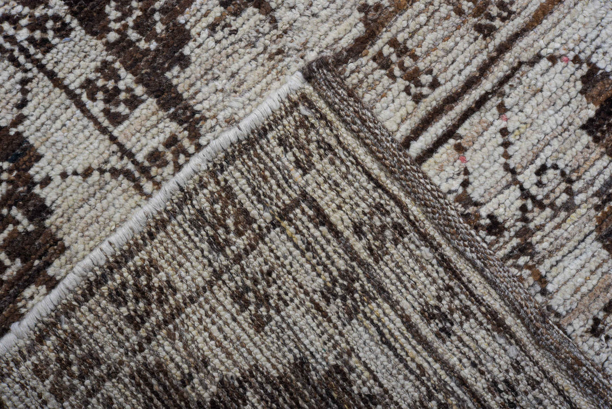 9' x 12' one-of-a-kind handmade vintage Tulu large size rug. Color palette: ivory, charcoal, taupe, brown, gray, black