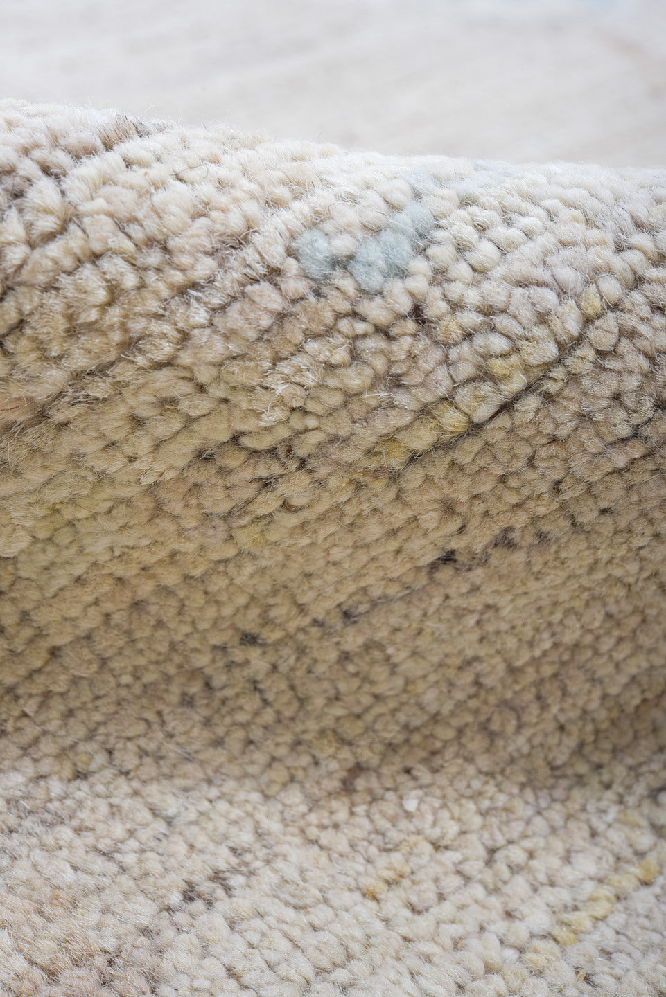 8' x 9' one-of-a-kind handmade vintage Tulu rug. Color palette: taupe, ivory, pale blue, beige, gray, light blue