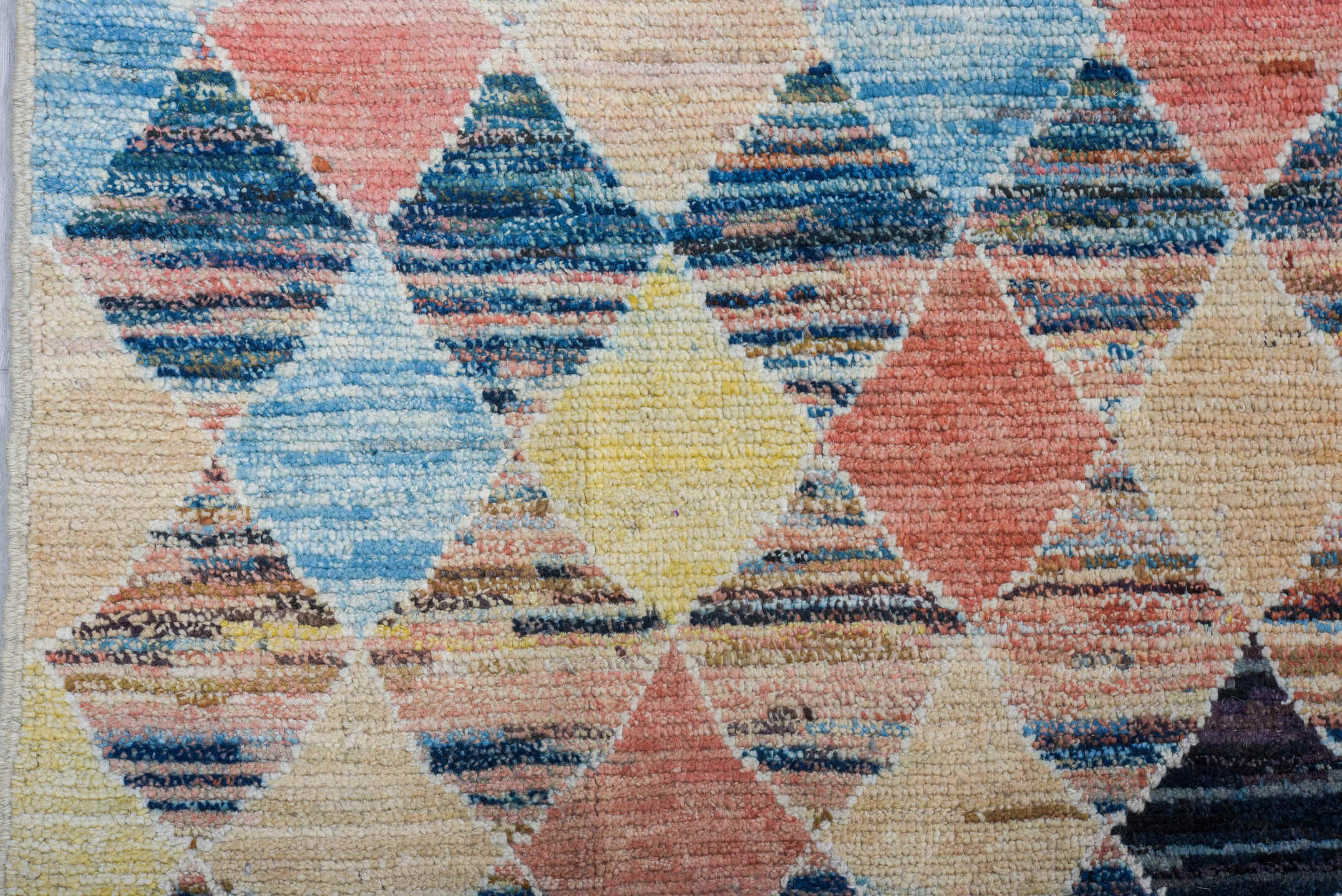 8' x 9' one-of-a-kind handmade vintage Tulu rug. Color palette: ivory, sky_blue, navy, coral, charcoal, cream, pale_yellow