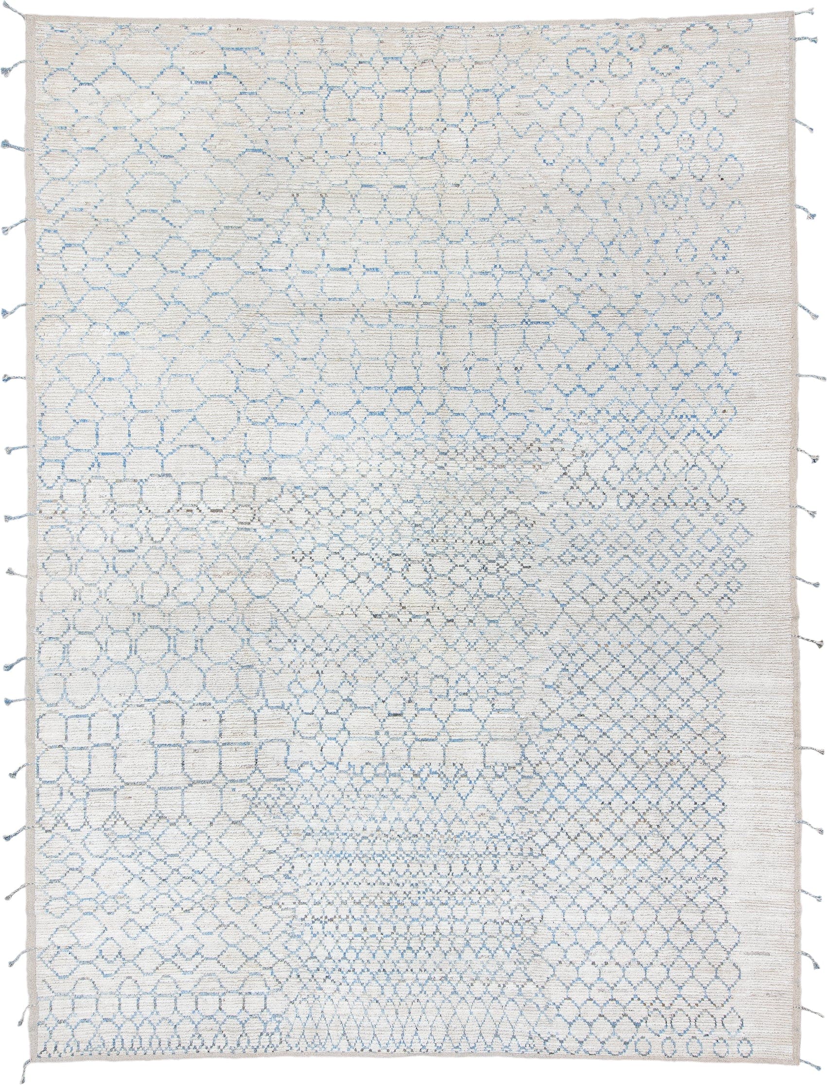 10' x 14' one-of-a-kind handmade vintage Tulu large size rug. Color palette: ivory, sky blue, light gray, cream, light blue
