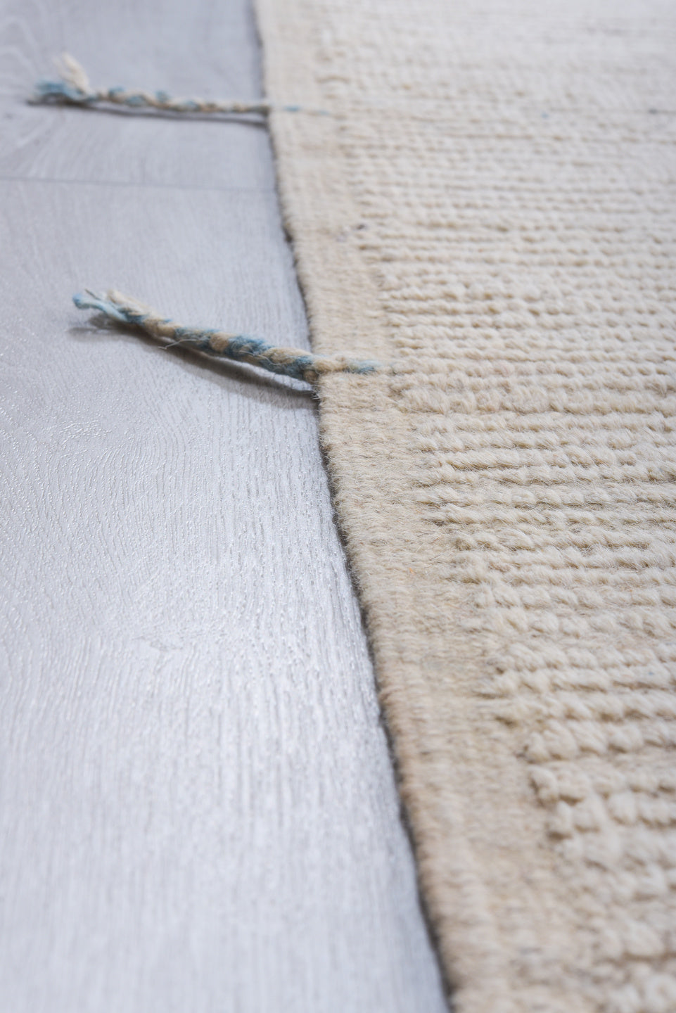 10' x 14' one-of-a-kind handmade vintage Tulu large size rug. Color palette: ivory, sky blue, light gray, cream, light blue