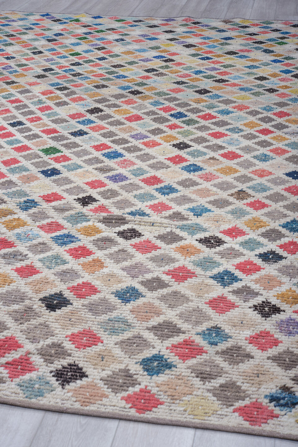 10' x 14' one-of-a-kind handmade vintage Tulu large size rug. Color palette: ivory, taupe, rose, sky blue, charcoal, camel