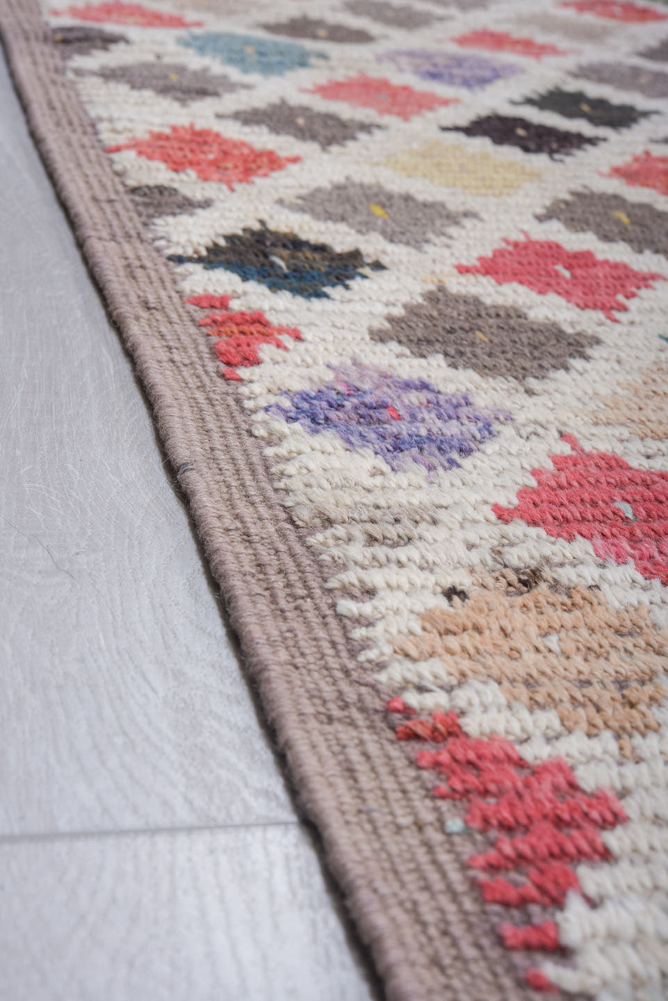 10' x 14' one-of-a-kind handmade vintage Tulu large size rug. Color palette: ivory, taupe, rose, sky blue, charcoal, camel