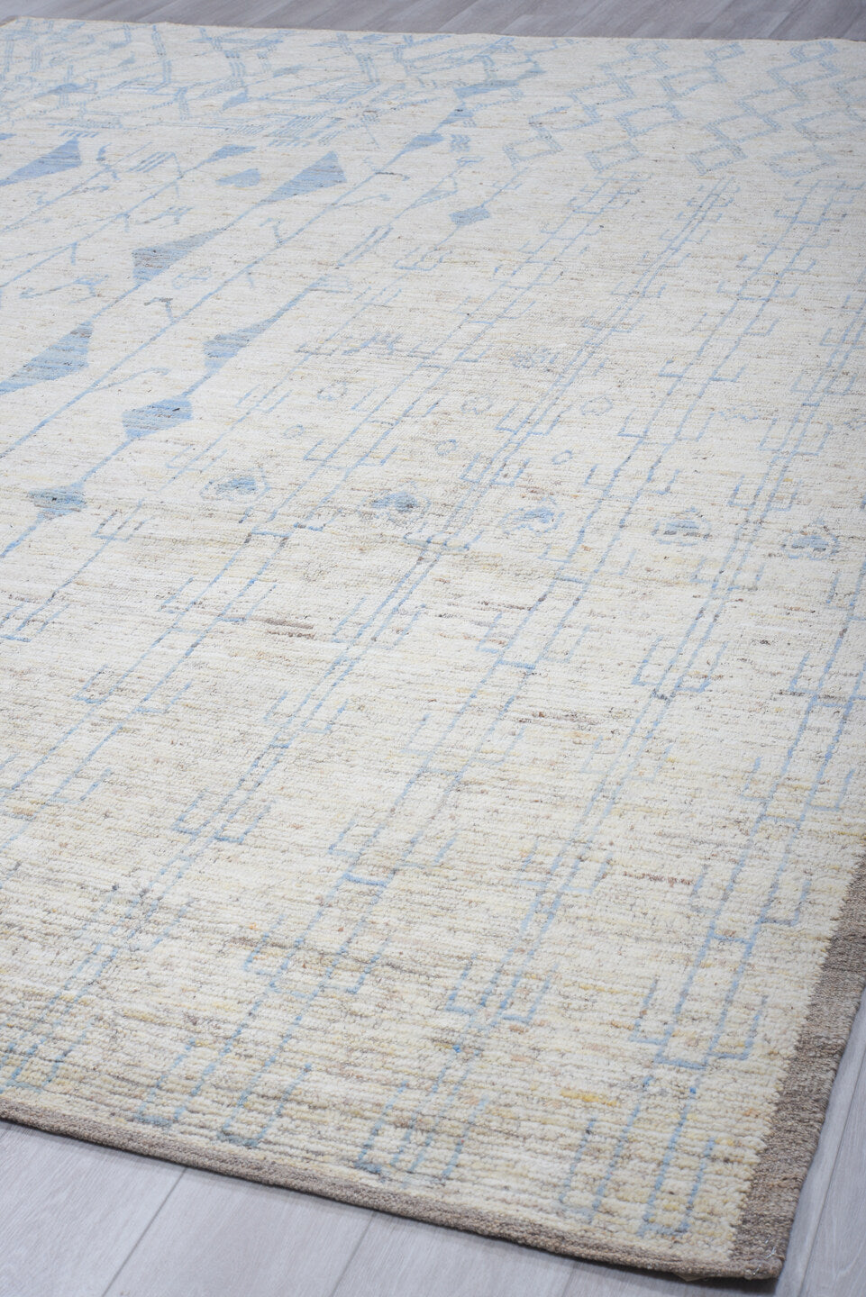 9' x 12' one-of-a-kind handmade vintage Tulu large size rug. Color palette: ivory, sky blue, taupe, cream, pale gray