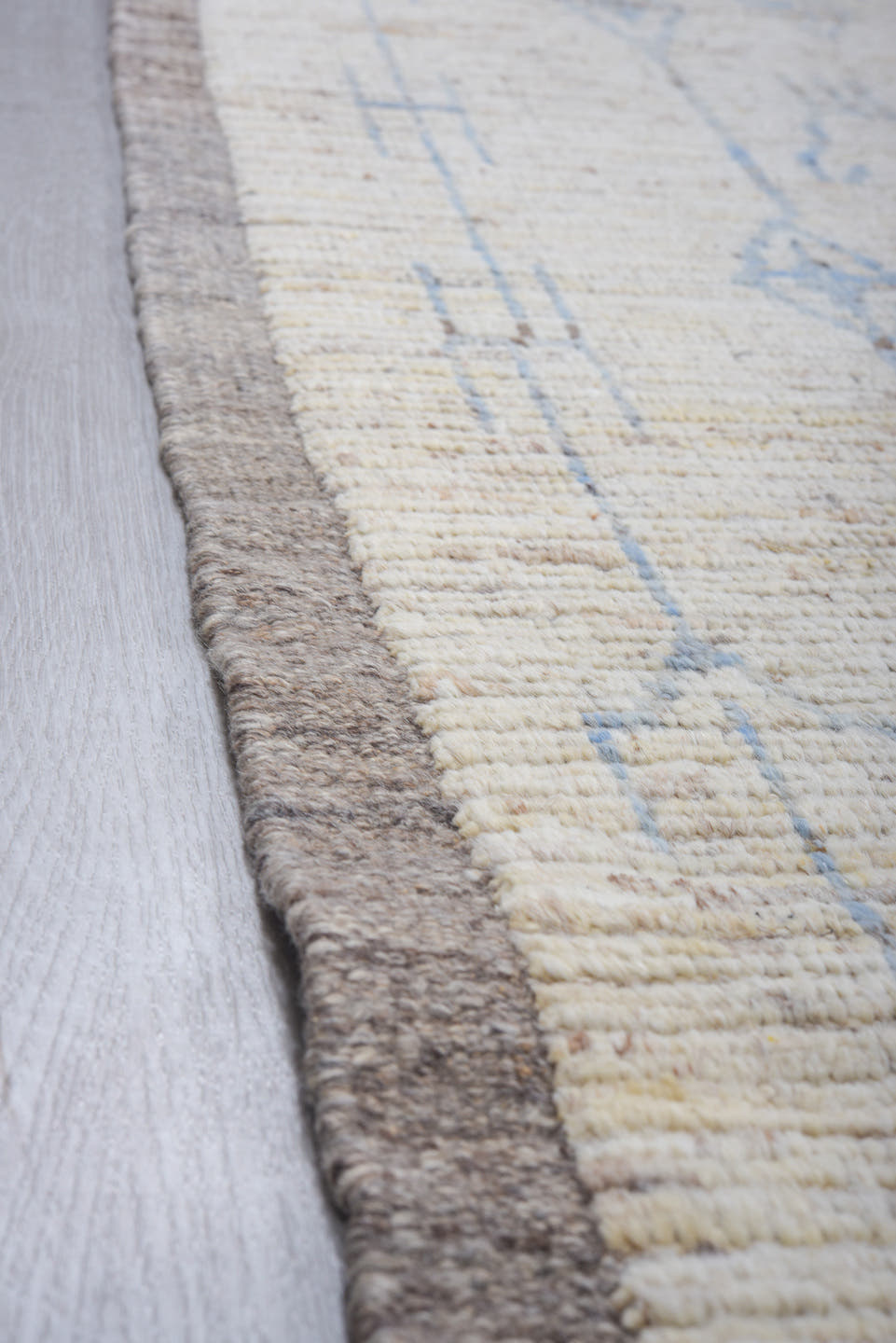9' x 12' one-of-a-kind handmade vintage Tulu large size rug. Color palette: ivory, sky blue, taupe, cream, pale gray