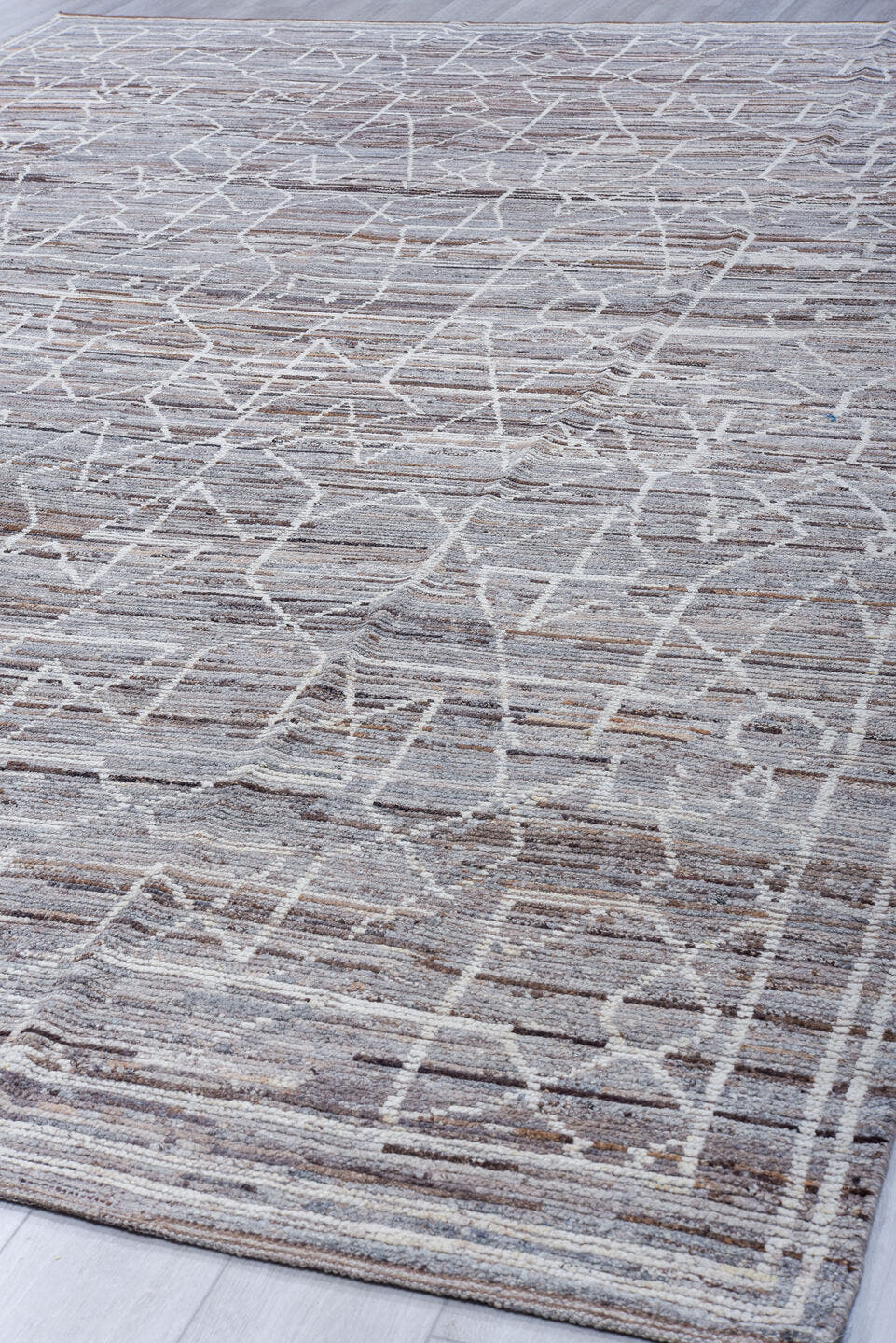 9' x 12' one-of-a-kind handmade vintage Tulu large size rug. Color palette: taupe, gray, ivory, brown, charcoal, beige