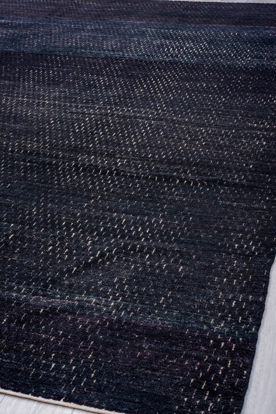 9' x 12' one-of-a-kind handmade vintage Tulu large size rug. Color palette: charcoal, indigo, slate, ivory, gray, black