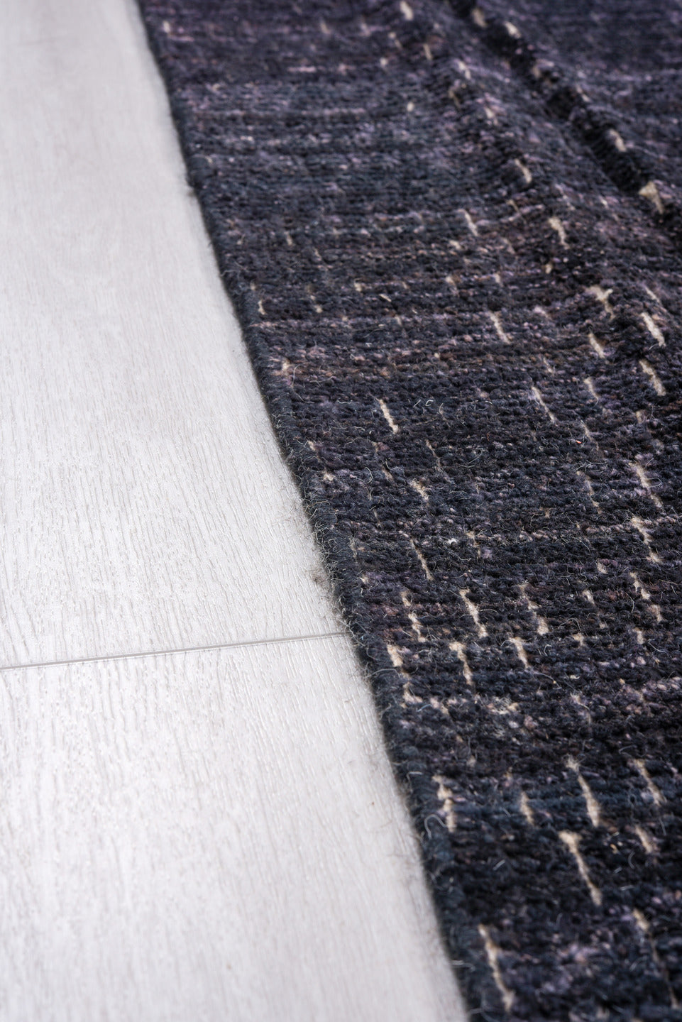 9' x 12' one-of-a-kind handmade vintage Tulu large size rug. Color palette: charcoal, indigo, slate, ivory, gray, black