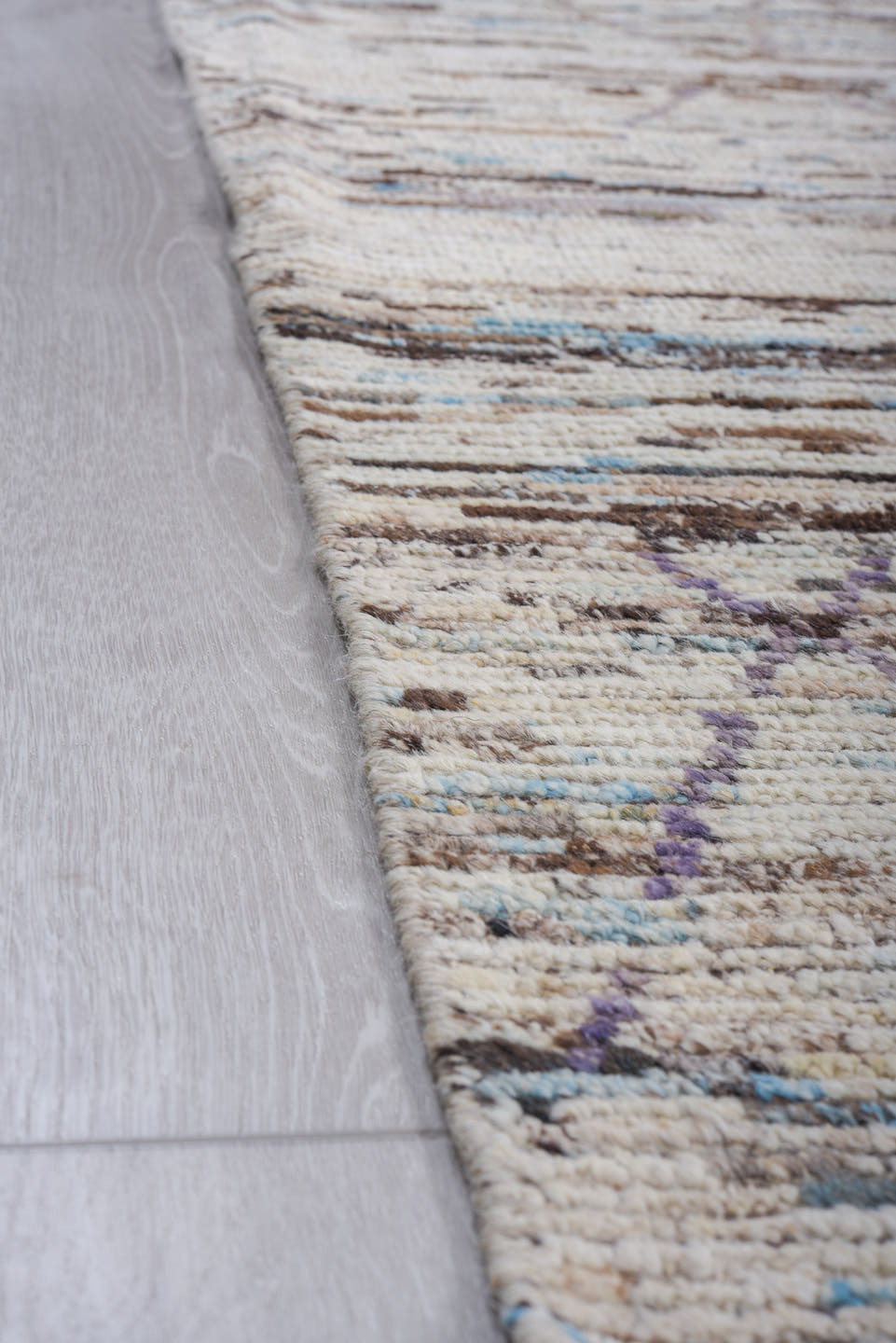 10' x 13' one-of-a-kind handmade vintage Tulu large size rug. Color palette: ivory, brown, charcoal, sky blue, taupe, gray