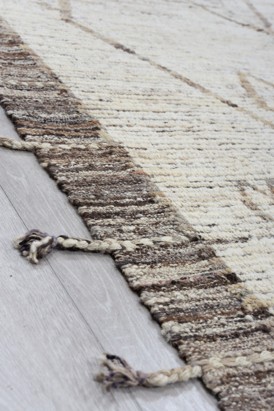 10' x 13' one-of-a-kind handmade vintage Tulu large size rug. Color palette: ivory, taupe, brown, charcoal, cream, beige