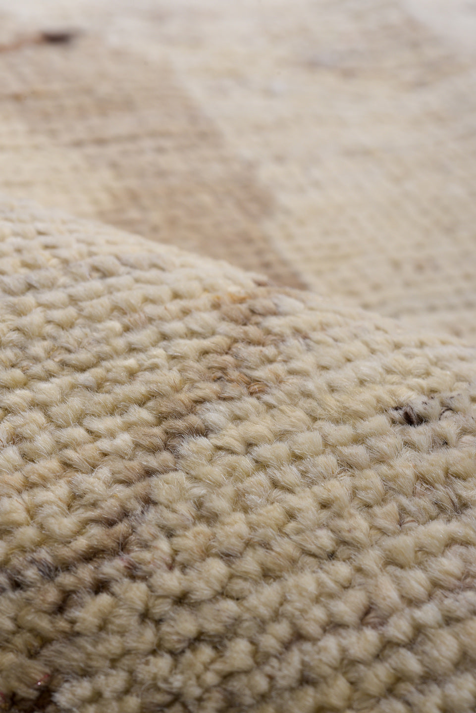 8' x 12' one-of-a-kind handmade vintage Tulu large size rug. Color palette: ivory, taupe, beige, brown, camel, charcoal