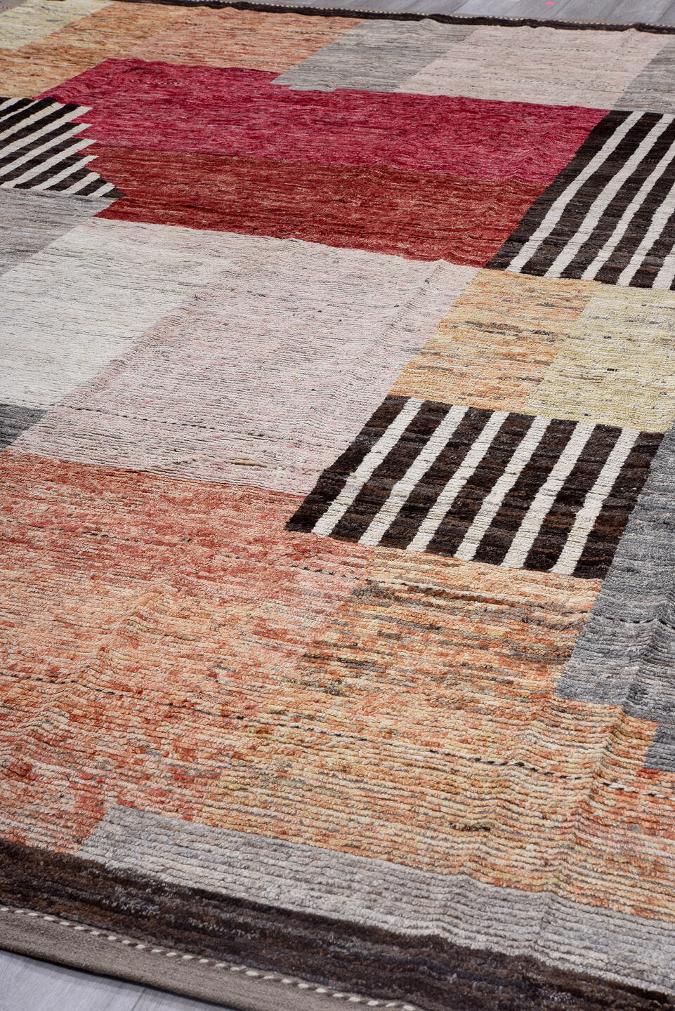 13' x 15' one-of-a-kind handmade vintage Tulu oversize rug. Color palette: ivory, gray, terra cotta, crimson, black, taupe