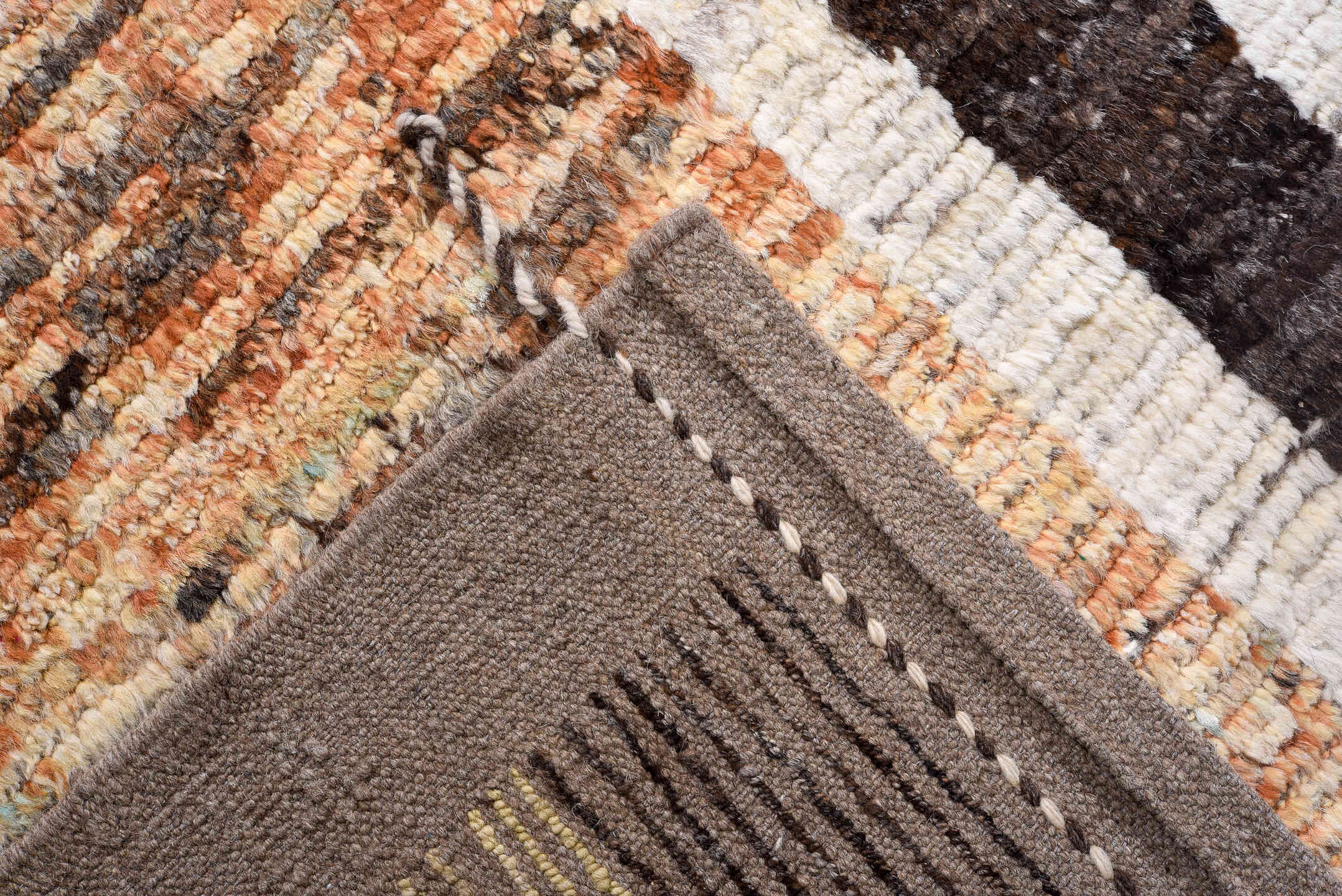 13' x 15' one-of-a-kind handmade vintage Tulu oversize rug. Color palette: ivory, gray, terra cotta, crimson, black, taupe