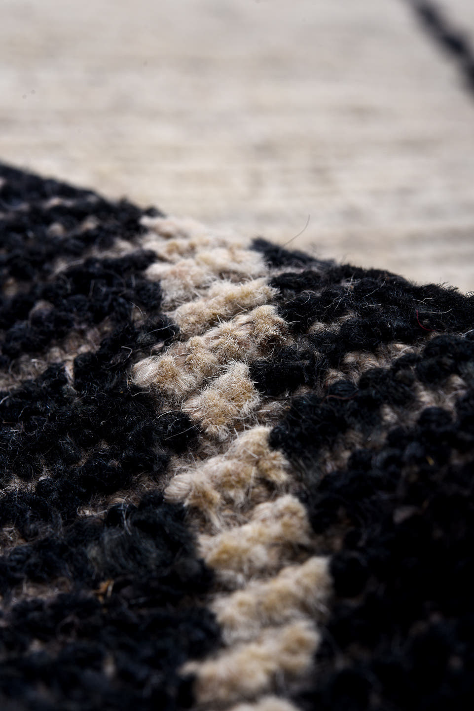 12' x 15' one-of-a-kind handmade vintage Tulu oversize rug. Color palette: ivory, charcoal, black, gray