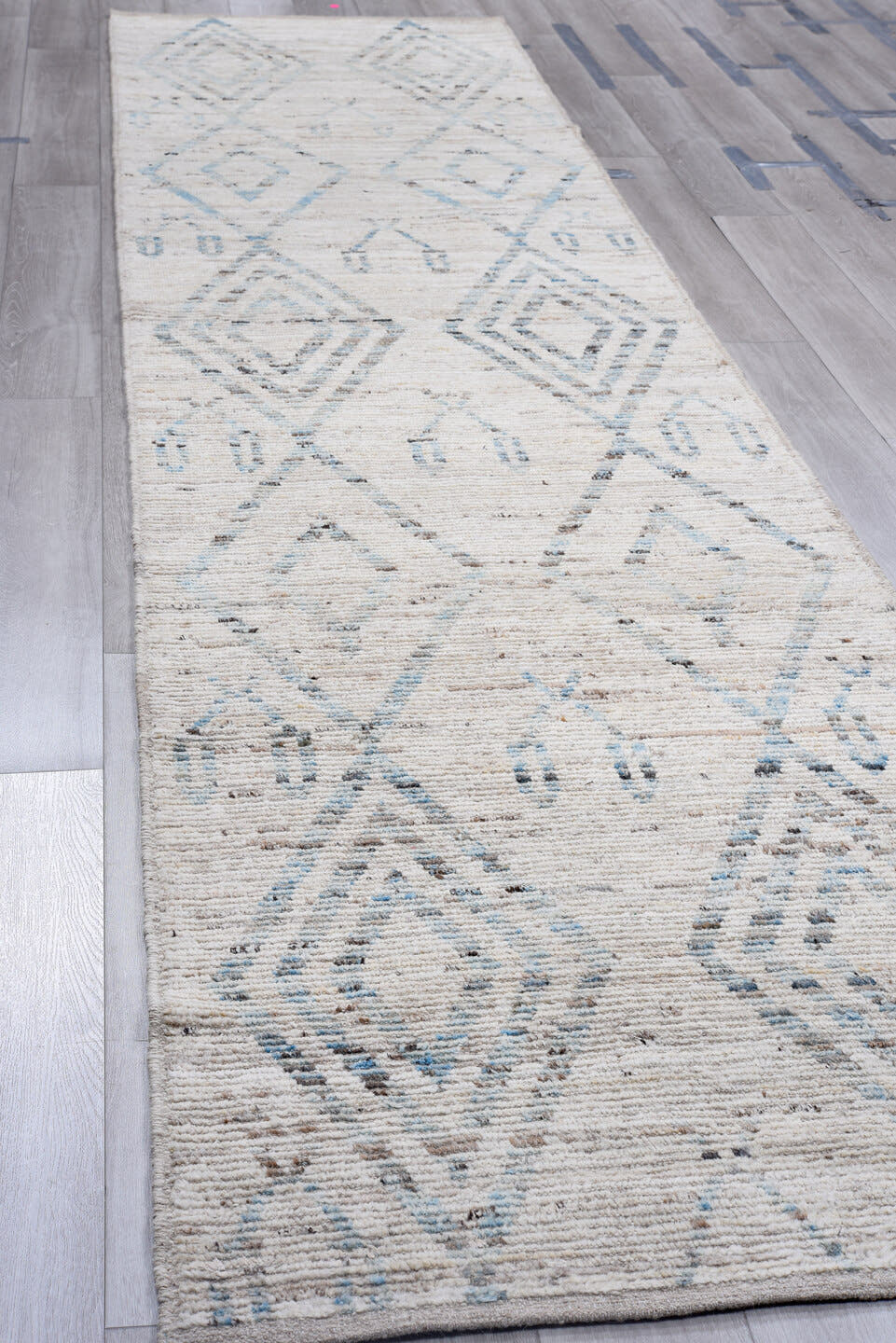 3' x 16' one-of-a-kind handmade vintage Tulu runner rug. Color palette: ivory, pale blue, taupe, charcoal, cream, light blue