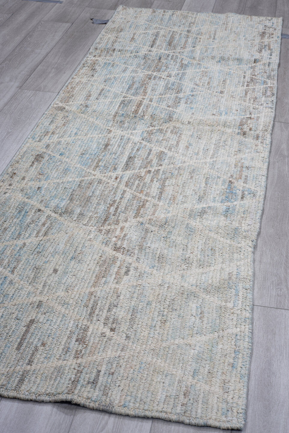 3' x 10' one-of-a-kind handmade vintage Tulu runner rug. Color palette: light blue, ivory, gray, taupe, charcoal, beige