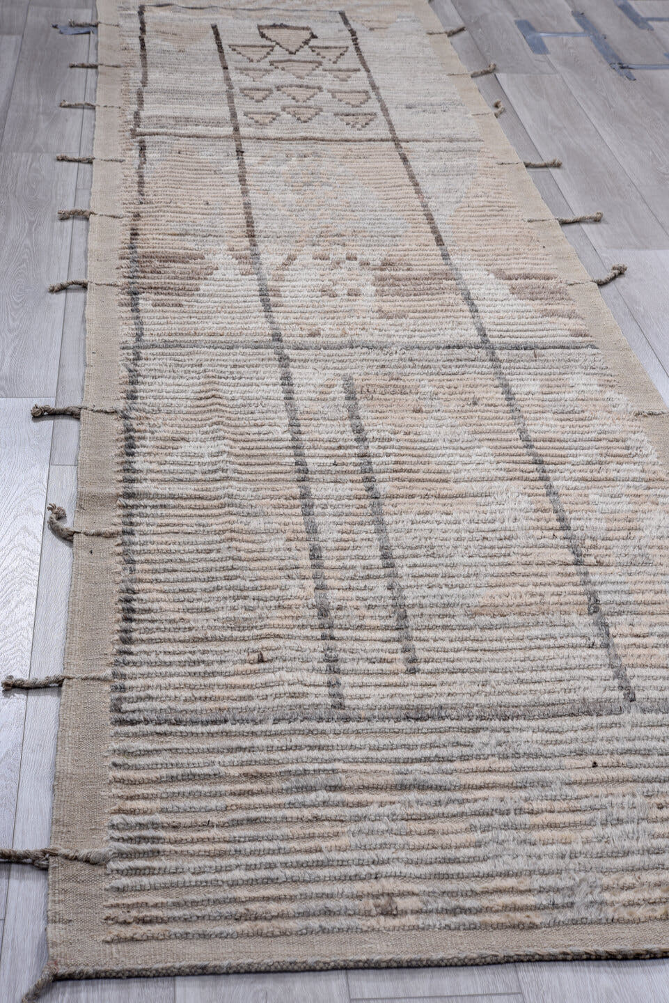 3' x 12' one-of-a-kind handmade vintage Tulu runner rug. Color palette: taupe, ivory, brown, gray, camel, beige