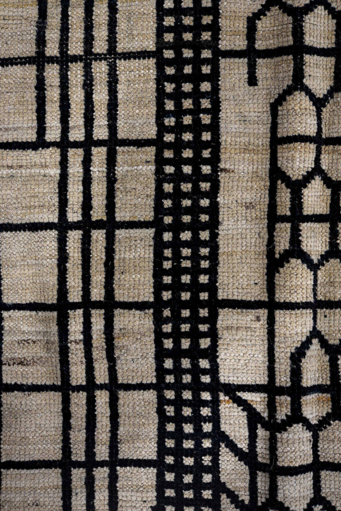 9' x 12' one-of-a-kind handmade vintage Tulu large size rug. Color palette: ivory, black
