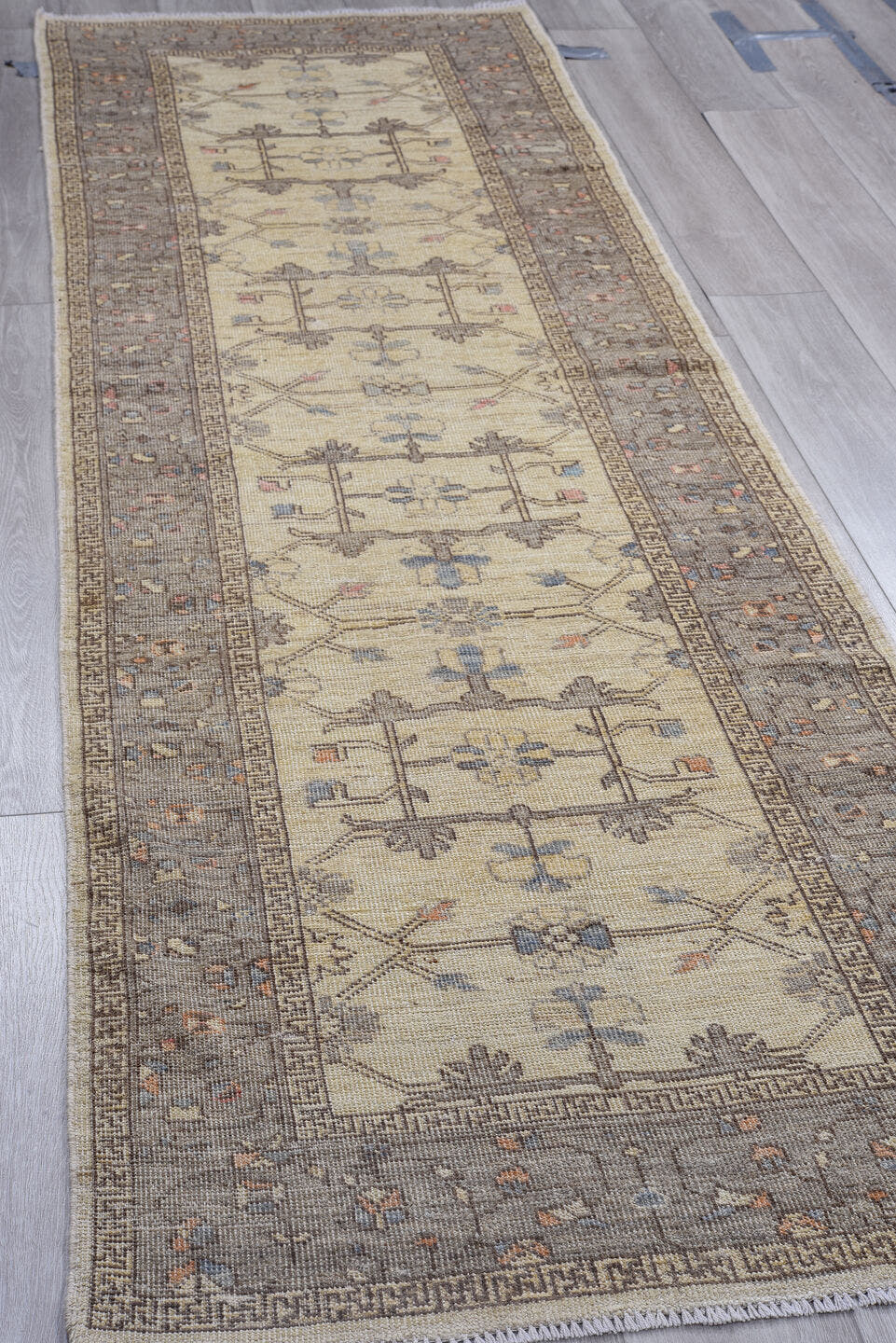 3' x 10' one-of-a-kind handmade vintage Oushak runner rug. Color palette: ivory, gray, taupe, slate, dusty blue, blush